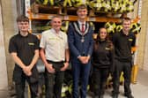 Wetherby Mayor, Councillor Connor Mulhall (centre), meets Arville’s apprentices and young team members during a factory tour led by Simon Hartley, Group Head of Engineering & Manufacturing Projects (second from left).