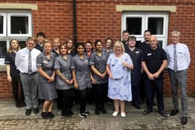 Helen Brown celebrates the ISO with colleagues.