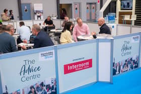Showgoers getting advice at the Homebuilding & Renovating Show.