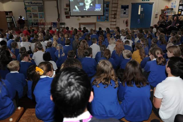 Harrogate pupils quizzed Chris Hadfield, the first Canadian astronaut to walk in space, at Richard Taylor Primary School.