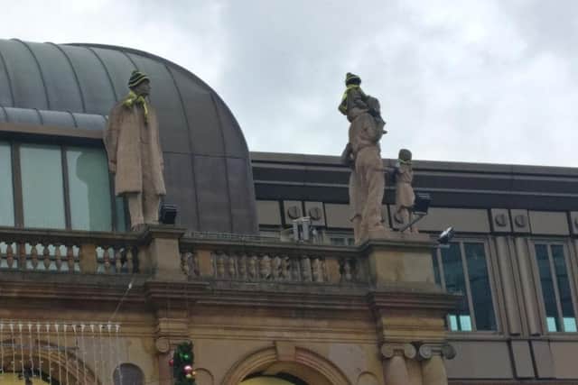 The 'new' Harrogate Town fans with their hats and scarves on top of the Victoria Shopping Centre.