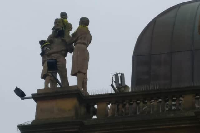 The statues on top of the Victoria Shopping Centre have all been given Harrogate Town hats or scarves ahead of the big FA Cup tie against Portsmouth.