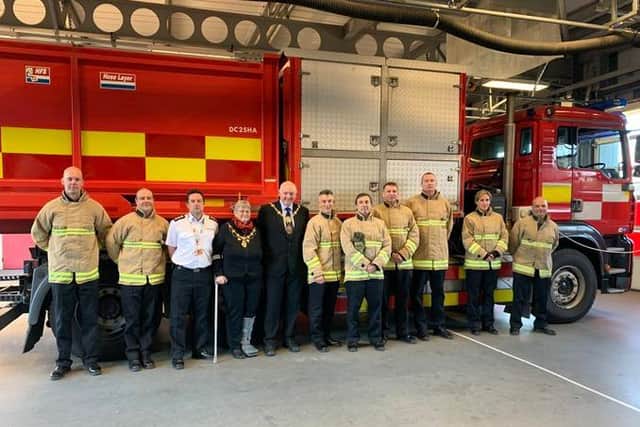 The Mayor and Mayoress of the Borough of Harrogate, Stuart and April Martin, thank firefighters at Harrogate Fire Station for their heroic efforts during the floods in South Yorkshire.
