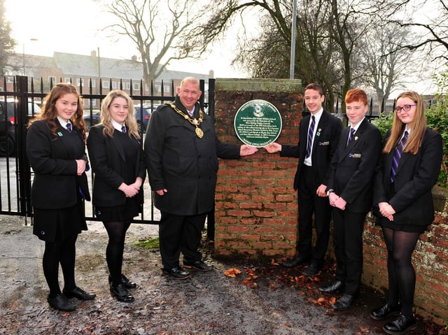 Ripon Mayor Eamon Parkin, and year 10 pupils James Cooper, Marcus Charlesworth, Hope Marnoch, Mia Kitching and Caitlyn-Eve Appleton. Picture: Gerard Binks.