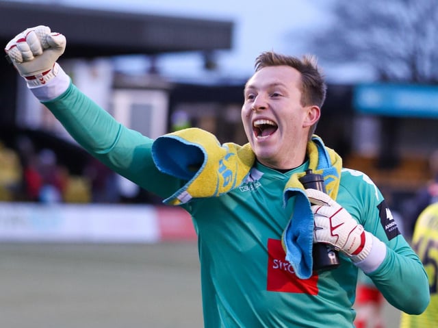 Joe Cracknell celebrates with the Harrogate Town fans after Saturday's FA Trophy third round success over Eastleigh. Picture: Matt Kirkham