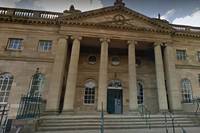 The terrified victim was also struck on the head with a Wet Floor sign as she cowered on the floor, York Crown Court heard.