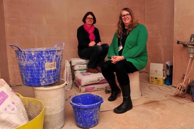 Melanie Whiteside and Lucy Gratton from Ripon YMCA inside the house that is being refurbished.