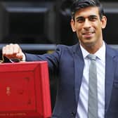 Chancellor Rishi Sunak outside 11 Downing Street, London, before heading to the House of Commons to deliver his Budget. PA Photo.