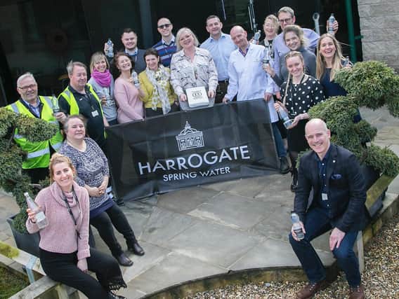 Staff at Harrogate Spring Water celebrate winning B Corp accreditation.
