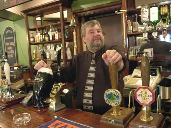 Derek Spiers behind the bar at The Yorkshire Lass in Knaresborough in 2002.