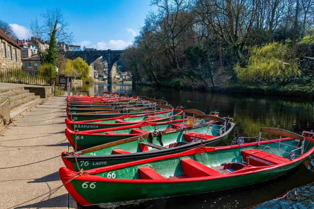 Empty rowing boats on the Nidd after the hire centre closed