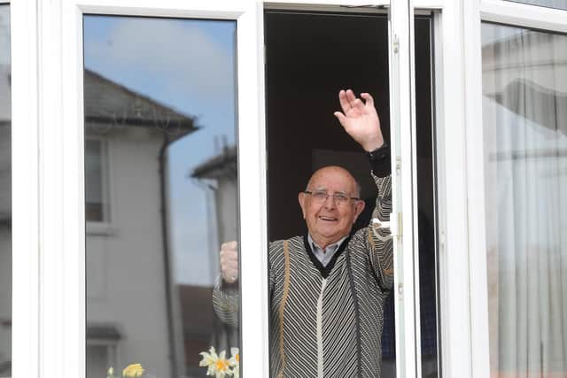 Cheerful and smiling despite the lockdown thanks to Oatlands Community Group: 91-year-old John Stott would like to say a big thank you to all volunteers in his neighbourhood. Picture: Gerard Binks.