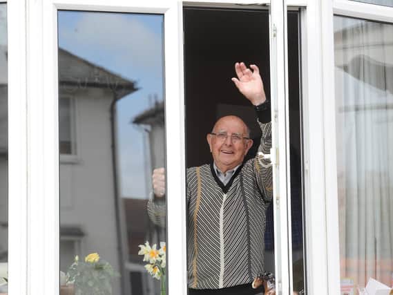 Cheerful and smiling despite the lockdown thanks to Oatlands Community Group: 91-year-old John Stott would like to say a big thank you to all volunteers in his neighbourhood. Picture: Gerard Binks.