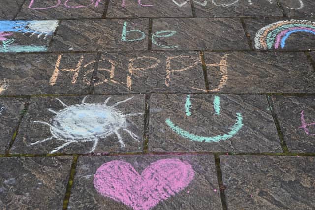Just some of the positive, cheerful artwork in the Oatlands community. Picture: Gerard Binks.