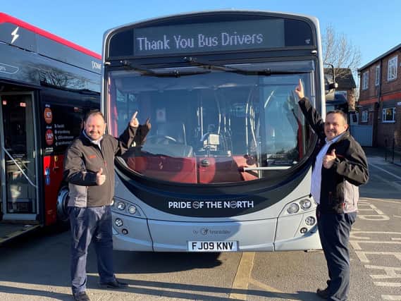 Transdev chief executive Alex Hornby, left, and operations director Vitto Pizzuti thank bus drivers as key workers during the COVID-19 pandemic.