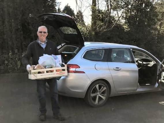 Volunteer Tony Johnson delivers food to a vulnerable person as part of the Bishop Monkton Together community support scheme.