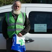 Harrogate District Green Party's ArnoldWarneken in front of his fully electric van, ready for deliveries.