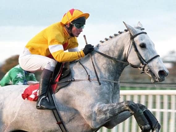 One Man and Richard Dunwoody on their way to winning the Charlie Hall Chase in 1997. Picture: Alan Wright (www.officialphotographersuk.com)
