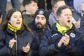 Harrogate Town supporters Molly Worton, left, and Dave Worton, right, are unlikely to be able to watch their team play any time soon. Picture: Matt Kirkham