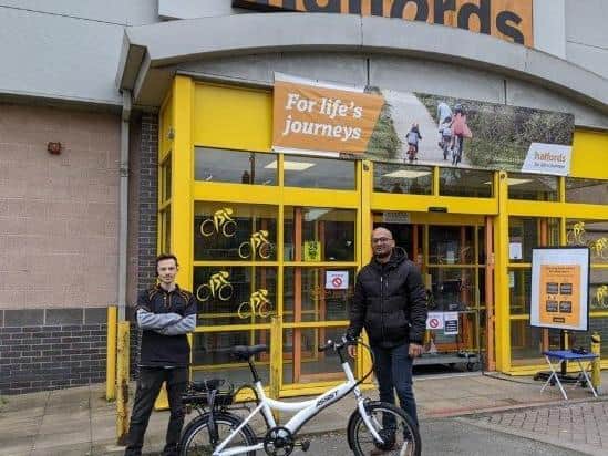 Harrogate Hospital doctor Naresh Gnanasekaran, right, with Daniel Locke of Halfords  who handed over the new bicycle to him at the Harrogate branch.