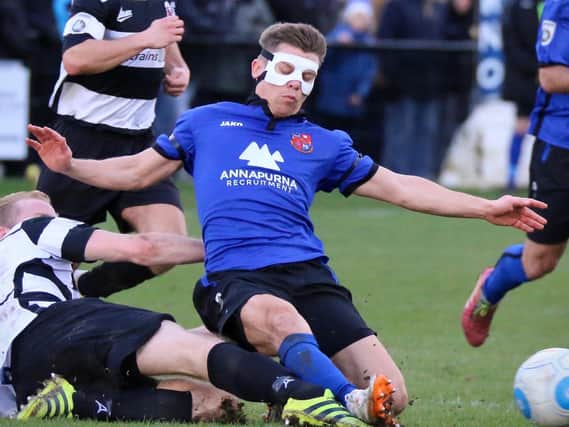 Harrogate Town midfielder Lloyd Kerry was forced to play in a face mask during the 2016/17 season. Picture: Matt Kirkham
