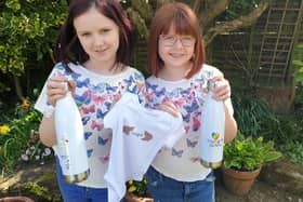 An inspiration to us all: Phoebe and Hermione Smith have designed a brightly-colouredrange of 'Happygate' merchandise with the aim of celebrating all the good things that have emerged in our community during this crisis.