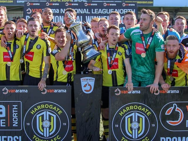 Harrogate Town players celebrate their 3-0 National League North play-off final victory over Brackley Town, a result which saw them promoted to English footballs fifth tier for the first time. Picture: Matt Kirkham