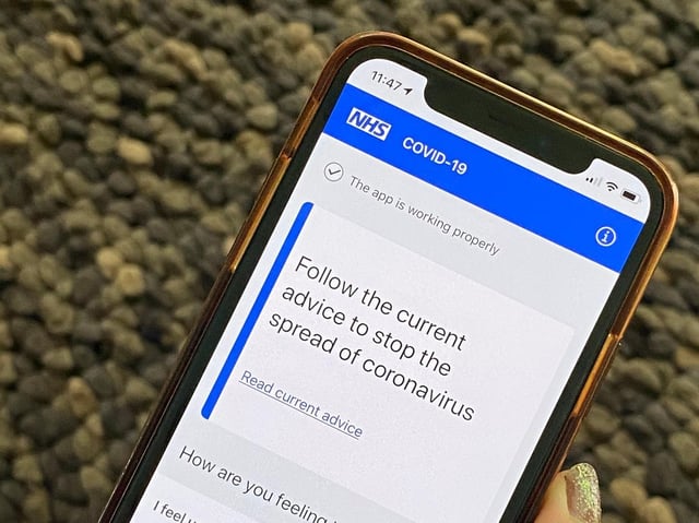 Department of Health and Social Care handout photo of of the NHS contact tracing app on a mobile phone. Photo: PA