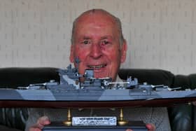 Harrogate Maurice Hammond, who may be the last man alive from the Royal Navys most deadly ship of the Second World War, pictured with a model of HMS Warspite.