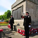 A bugler sounds the start of the VE Day two minutes silence at 11am at the War Memorial in Harrogate. Picture Gerard Binks