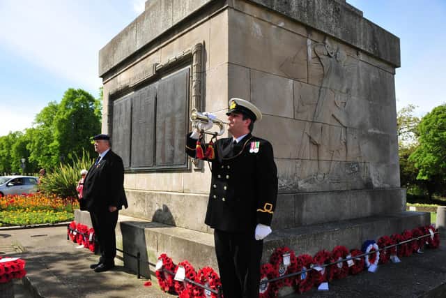 A bugler sounds the start of the VE Day two minutes silence at 11am at the War Memorial in Harrogate. Picture Gerard Binks