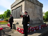 A bugler sounds the start of the VE Day two minutes silence at 11am at the War Memorial in Harrogate. Picture Gerard Binks