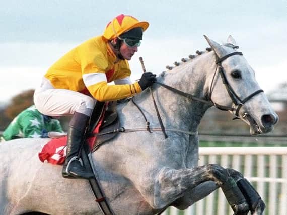 One Man and Richard Dunwoody on their way to winning the Charlie Hall Chase at Wetherby in 1997. Picture: Alan Wright (www.officialphotographersuk.com)