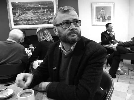 What was normal now looks abnormal -  The Harrogate Advertiser's Graham Chalmers in Marconi cafe in Harrogate prior to the coronvirus pandemic and social distancing which have caused all this to look like history.