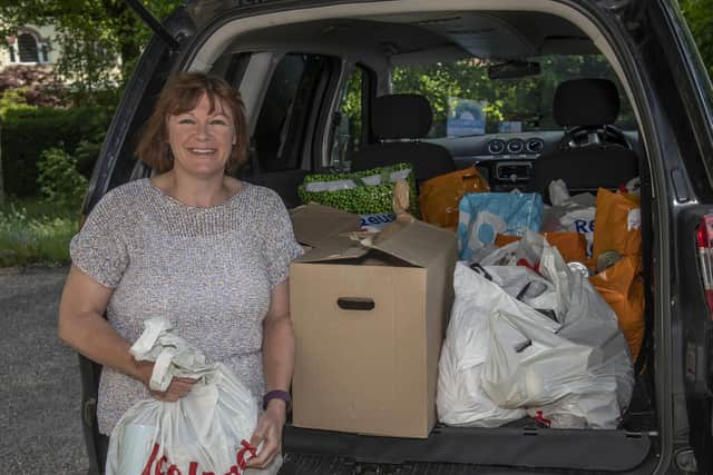 Catherine Crompton collecting another load of items