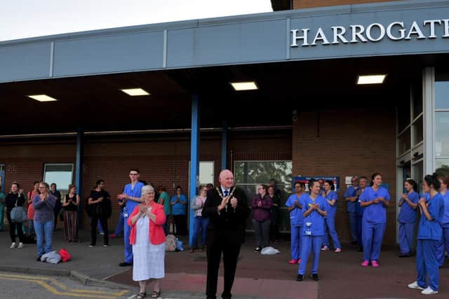 April Martin was last night joined by her husband, mayor Stuart Martin, and scores of staff outside Harrogate District Hospital. Photo: Gerard Binks.