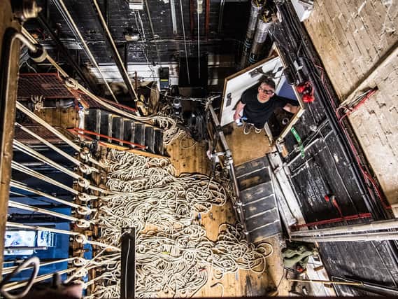 Harrogate Theatre's David Bown looks up from the stage in one of the revealing photos of an empty arts hub under lockdown. (Picture by Jude Palmer)