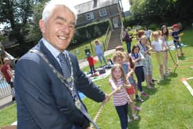 NAWN 1806101AM1 Sandringham Park Funday. The Mayor of Wetherby Coun Galan Moss has his work cut out in the tug o war (1806101AM1)