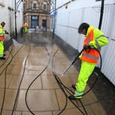A deep clean of Harrogate town centre gets underway - Pictured are the team from UK Nationwide Cleaning Services working in the market place and cross James Street area.