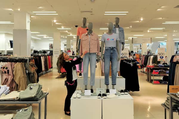 Harrogate stores prepare to open from lockdown safely. Pictured here is staff member Jo Fowler preparing the clothes department at Marks and Spencers store on Cambridge Street in Harrogate earlier in the week. (Picture Gerard Binks)