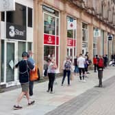 Harrogate town centre saw long queues at some shops today as the retail sector reopened - the longest was outside Victoria Shopping Centre for Sports Direct.