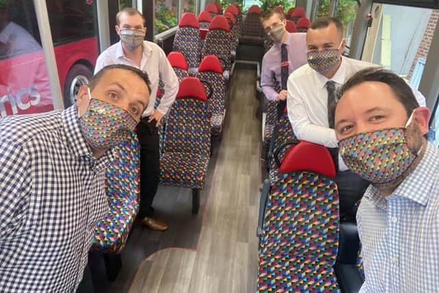 The Harrogate Bus Company team with their face masks.