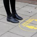 Distance markers outside shops. Picture Richard Ponter.