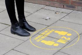 Distance markers outside shops. Picture Richard Ponter.