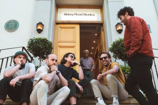Leeds band Heir larking around on the footsteps of Abbey Road studios in London with legendary producer Ken Scott keeping a watchful eye in the door way.