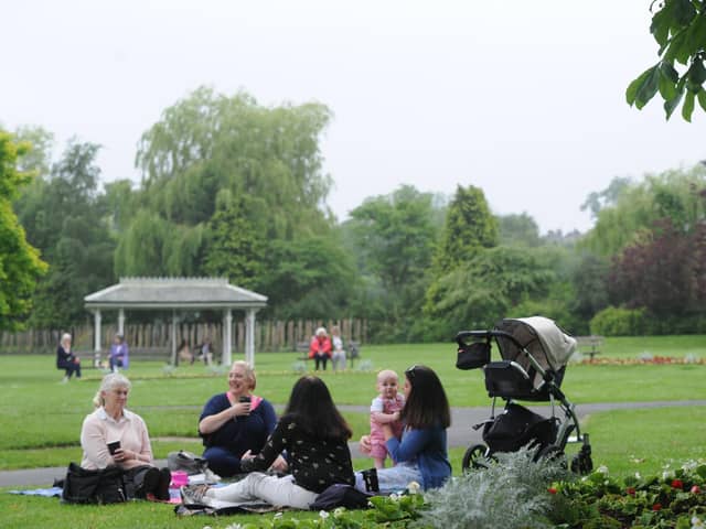 People enjoying Valley Gardens in Harrogate.