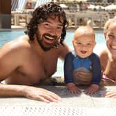 Gareth Oliver with wife Alice and son Sorrento.