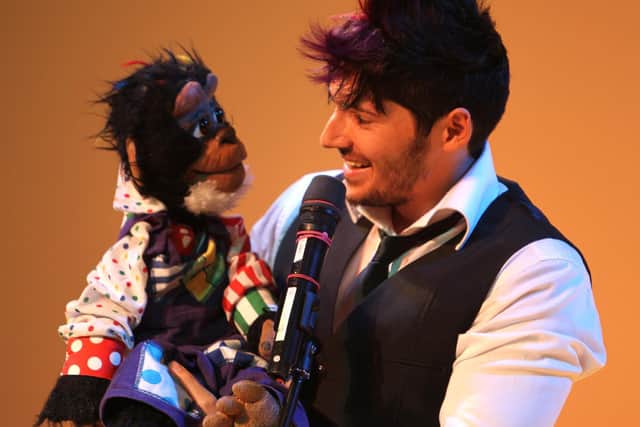 Comedian and ventriloquist Gareth Oliver performing on stage back in 2011.