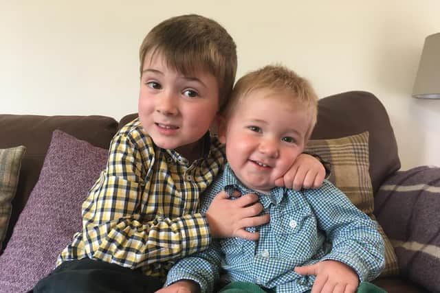 Four-year-old Aidan Hodgkiss and his one-year-old brother, Vinny.