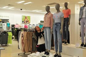 M&S staff member Jo Fowler preparing the clothes department at Marks and Spencers' main store in Harrogate for reopening earlier this week. (Picture Gerard Binks)